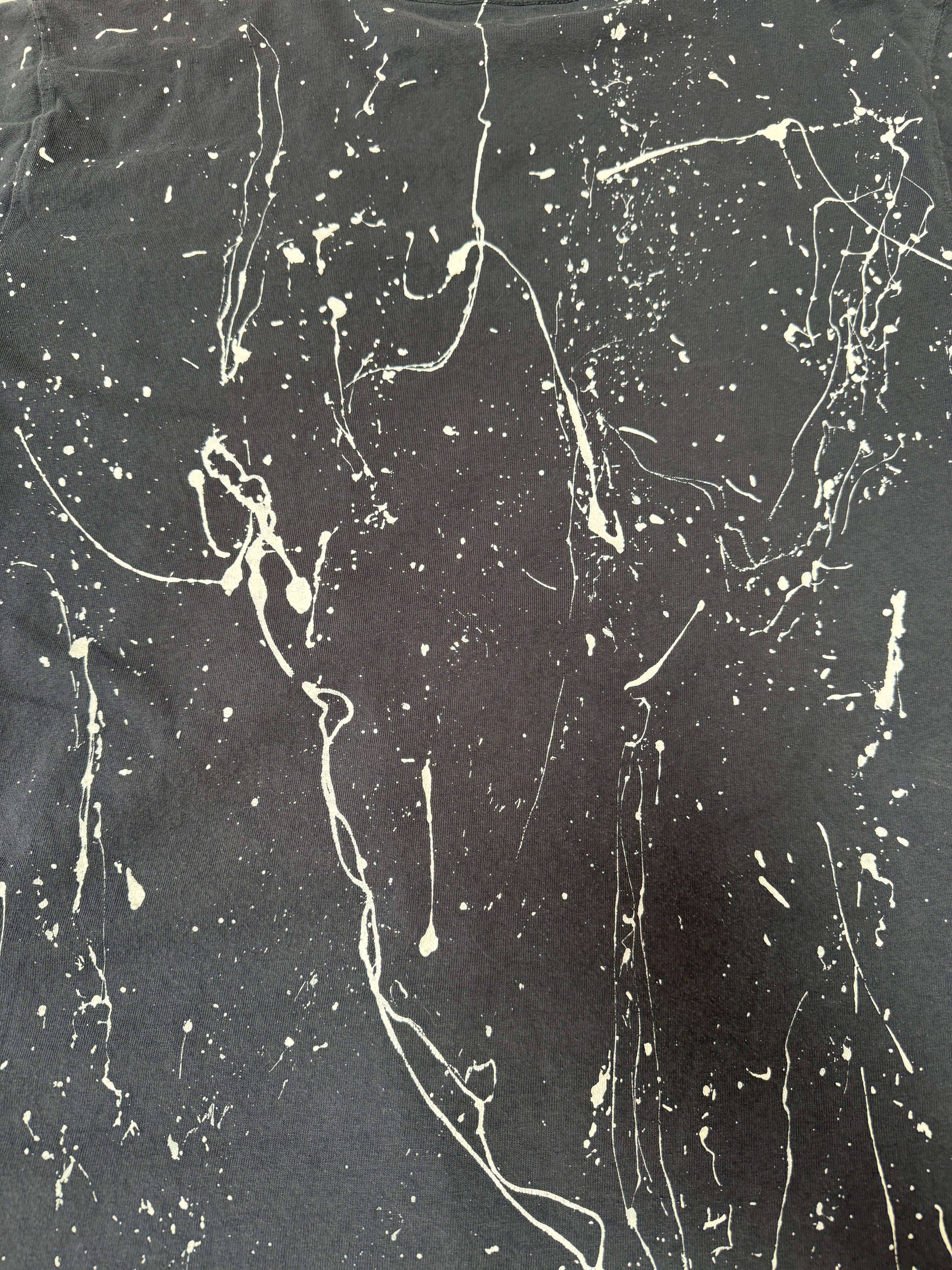Close-up of hand-painted splatter detail